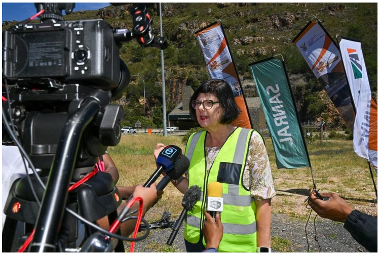 Transport Minister Barbara Creecy explains the significance of the Huguenot Tunnel upgrades to media