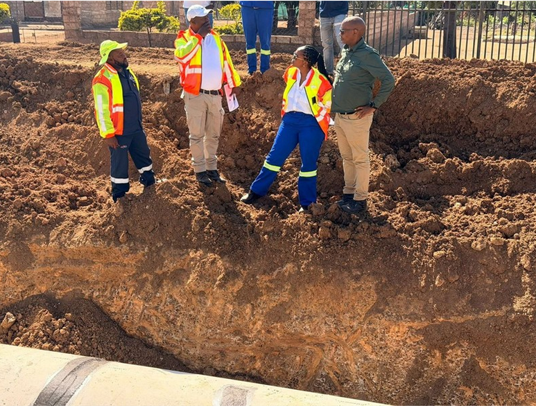 MMC for Roads and Transport Tlangi Mogale and other officials inspect the work that is already done in the area. 