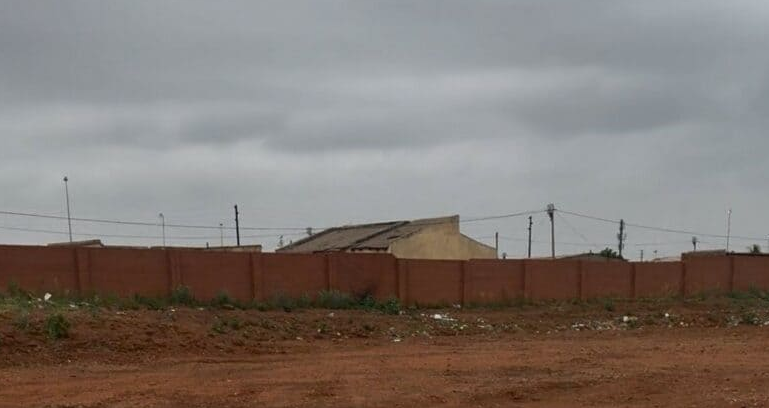 Only a wall surrounding the site can be seen at this project that has had three contractors and several missed completion dates, the latest being 8 March 2021.