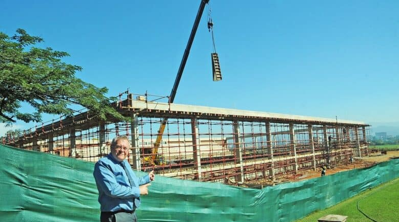  St Charles College principal Allen van Blerk next to the Aquatic Centre under construction on college grounds. 