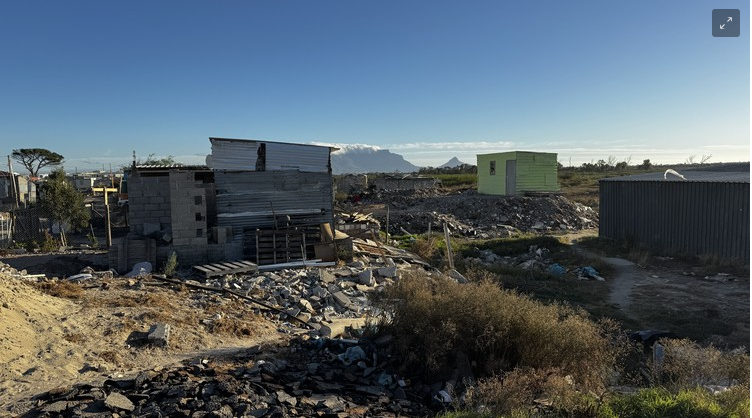 A High Court interdict has blocked building of homes in Zwezwe informal settlement on the Diep River floodplain. 