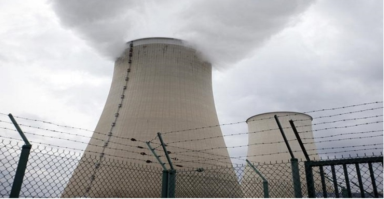 Steam rises from the cooling towers at a nuclear power station. 