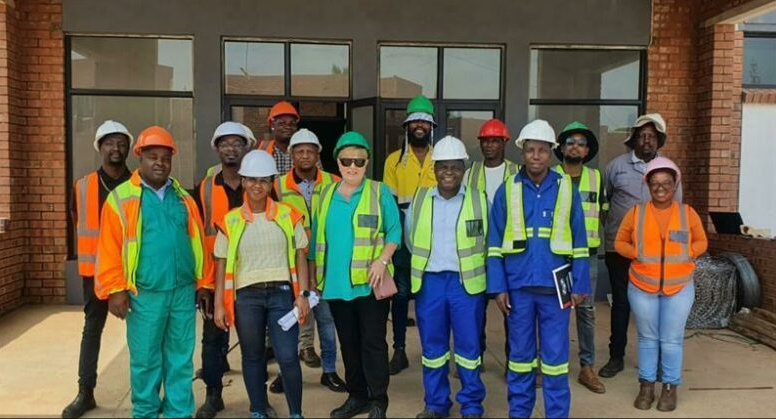 MMC for Health, Rina Marx (centre) together with officials from Department of Health and construction workers at the new Lusaka Clinic in Mamelodi.