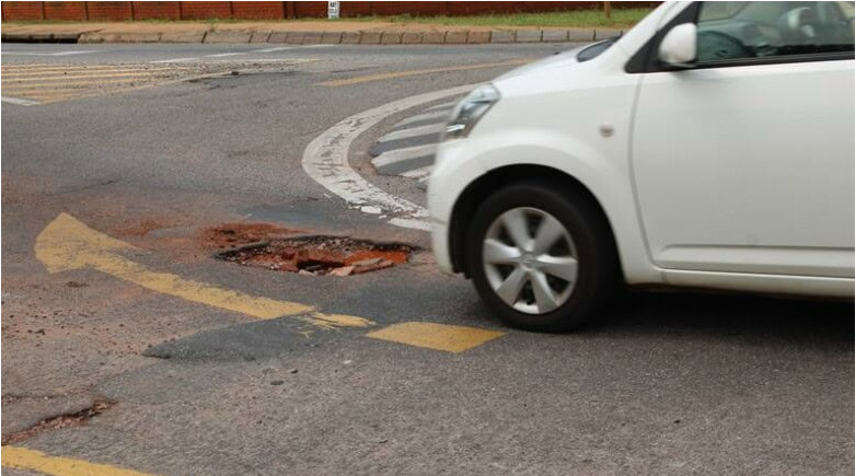  Motorists are frustrated over the huge pothole. 