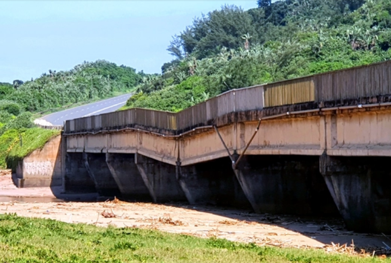  The bridge partially collapsed during the April floods, but motorists are still trying their luck by crossing it daily. 