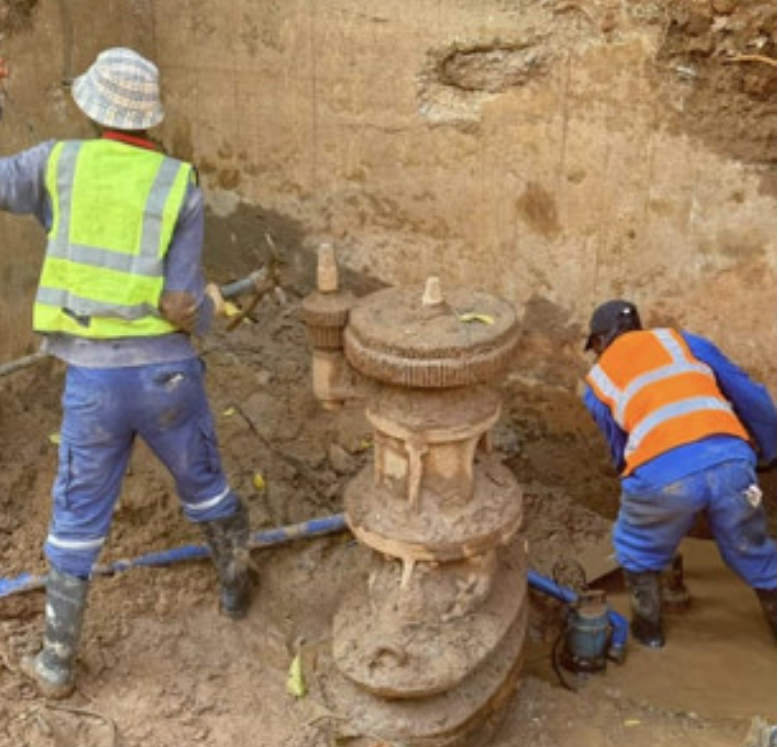 Workers uncover the valve after 48 hours.