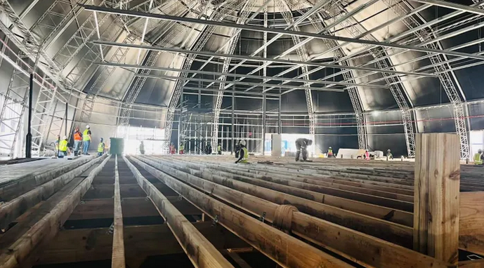 Construction progress on the Nieuwmeester Dome in Cape Town, set to accommodate the State of the Nation Address replies, faces delays due to technical issues.