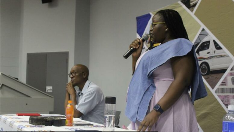 MEC Kedibone Diale-Thlabela speaks as MPL Parks Tau looks on.