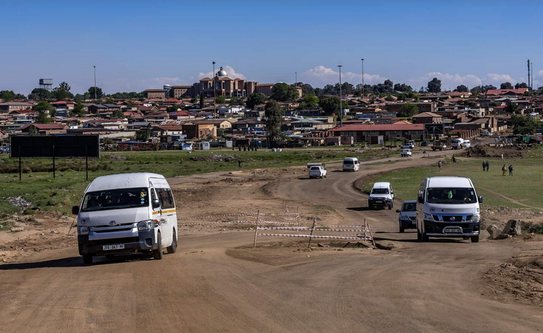 Traffic moves along a section of Magwaza Street that remains under construction.