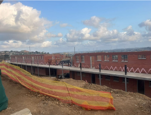 Recent construction stoppages and intimidation tactics at Menzi High School have delayed a R37.8 million project to enhance educational facilities. 