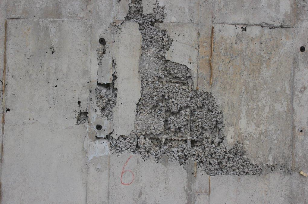 The large areas of honeycombing are usually as a result of poor compaction practices and incomplete placement of concrete in formwork.