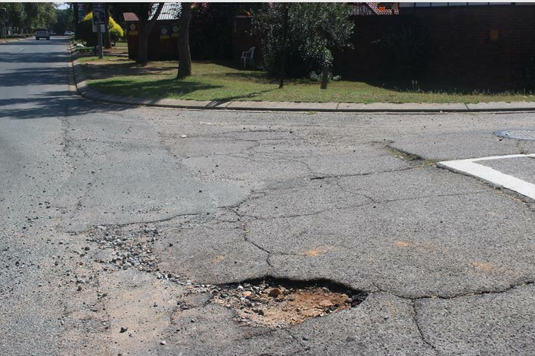  Achter Road hosts a series of rather deep potholes.