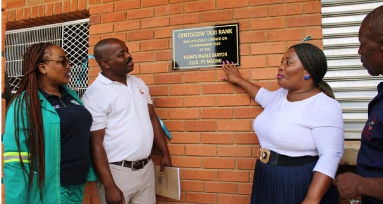 Dr Nkosazana Dlamini-Zuma Municipality Mayor Sindisiwe Msomi [in white top] joined by other officials at the opening of the taxi rank. 