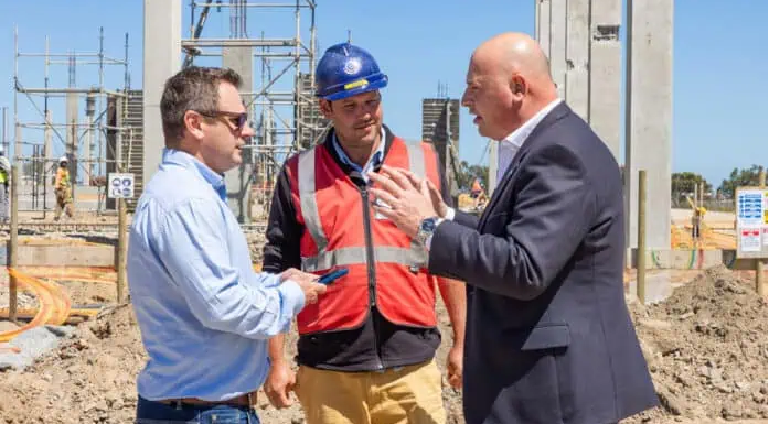 Atterbury Property Western Cape Development Manager Gerrit van der Berg, with Barry Strydom, Isipani Construction and Alderman James Vos, City of Cape Town Mayoral Committee Member for Economic Growth.