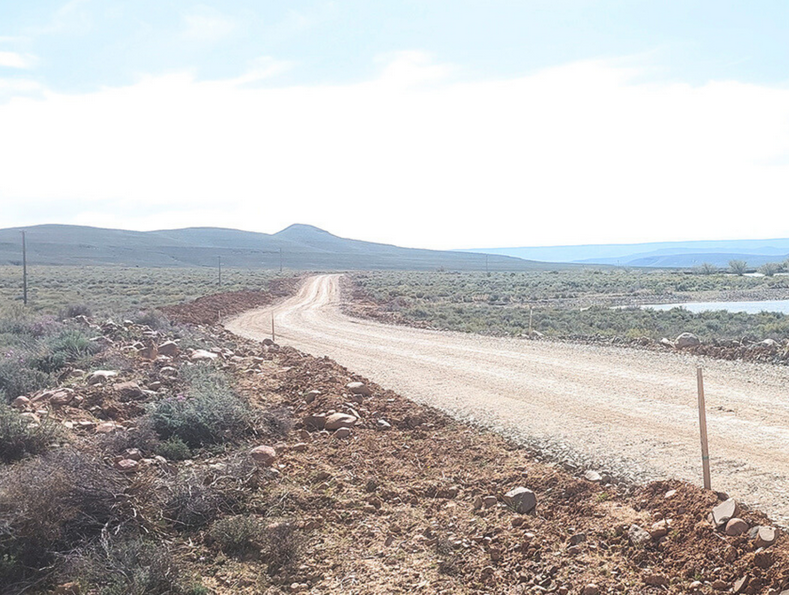 At the Karreebosch Wind Farm facility, Concor ensures careful management of the road servitude close to the water body.