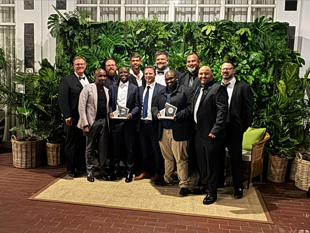 Representatives of Corestruc; and its clients accept Fulton Awards for their projects.