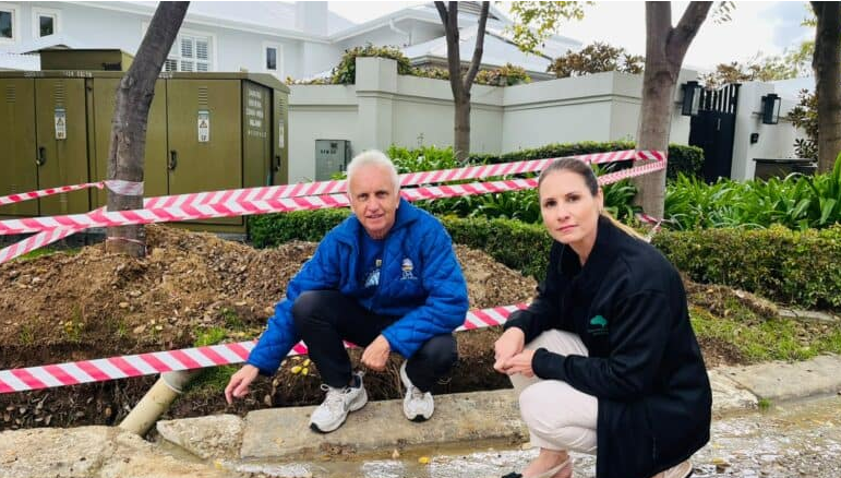 Ward 94 councillor David Foley and the estate manager Charlene Marlin on Chorisia Lane.