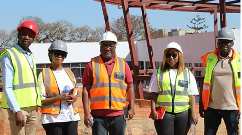 onald Kubai from Department of Higher Education and Training, with members from National Treasury, and Matsiababa Motebele, Unisa Vice-Principal: Facilities and Operations 