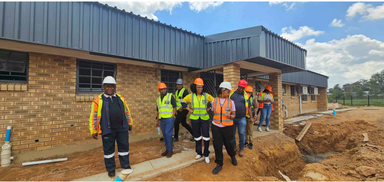 MEC Mance at the newly build media centre and computer labs for Dome Combined School.