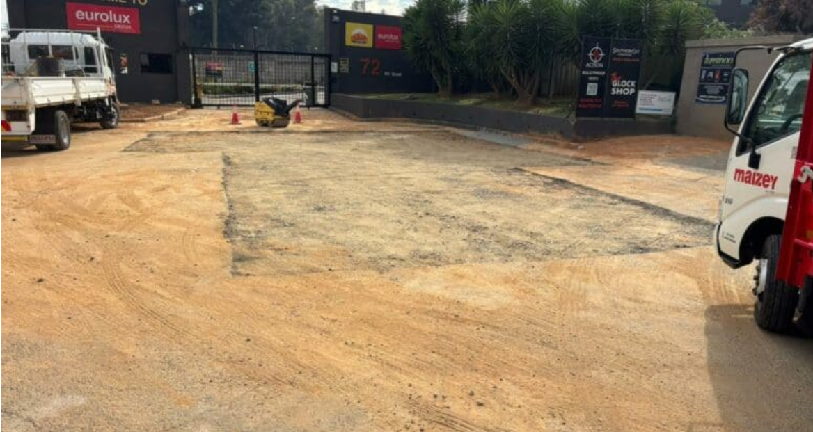 The damaged section of road outside 72 5th Street in Wynberg has been backfilled and prepared for final tarring. 