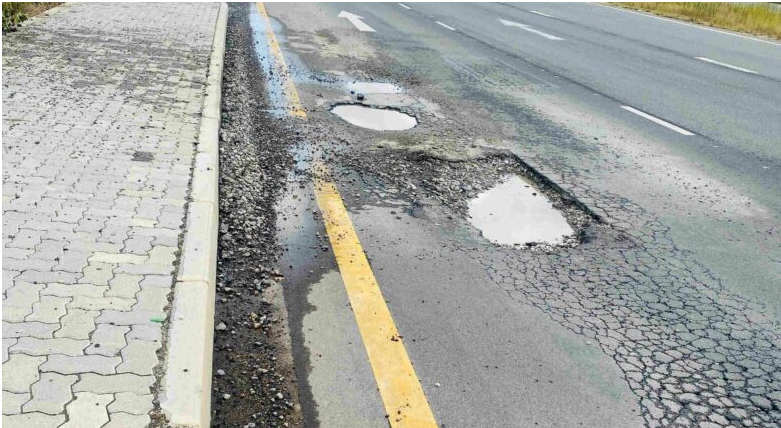 Potholes start to form on Allandale Road. 