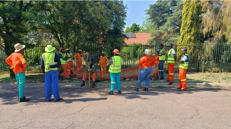 Municipal workers on the road. 