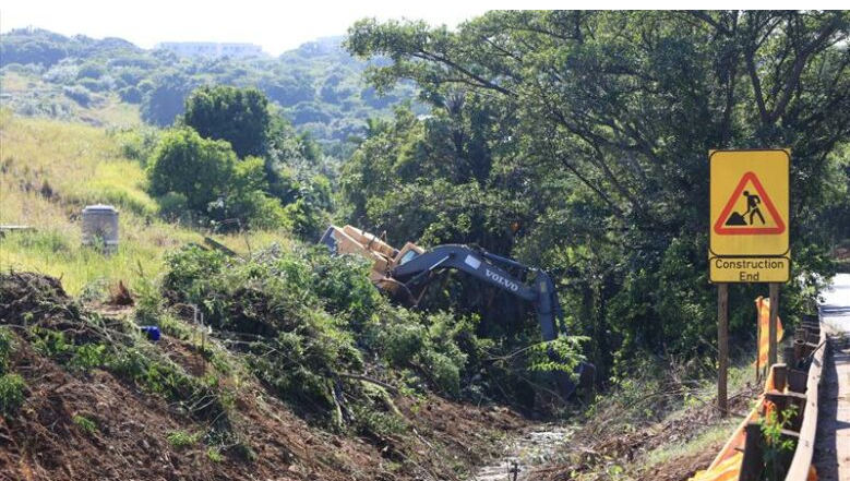  Heavy earth moving machinery clearing a section of the Sweetwater Stream in Umdloti on Friday, 6 February. 