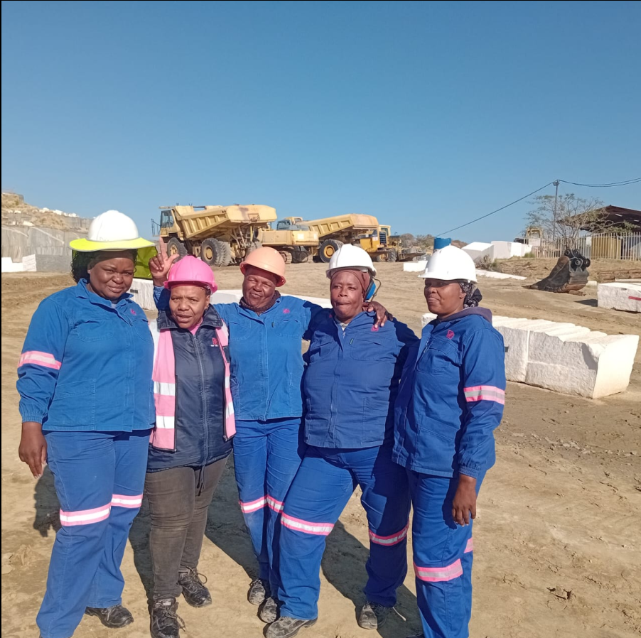 Dorah (second from the right) with some of her colleagues who are thriving in the dimension stone mining industry.