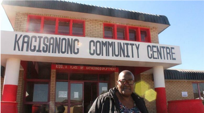  Tshegofatso Moswabi outside the main entrance of the Kagisanong Community Centre. 