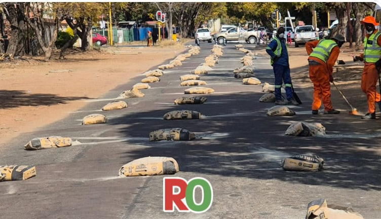 Road workers prepare a section of Voortrekker Street for rehabilitation work. 