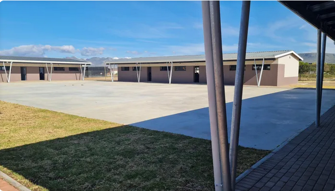 The Fisherhaven Academy development faces scrutiny from residents concerned about its impact on wildlife and the local ecosystem.