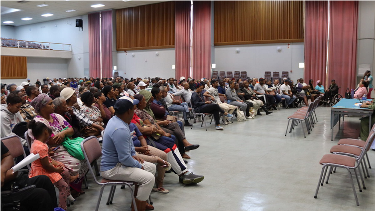 Beneficiaries fill Strand Town Hall for the election of Project Engagement Committee representatives for the Rusthof housing project.