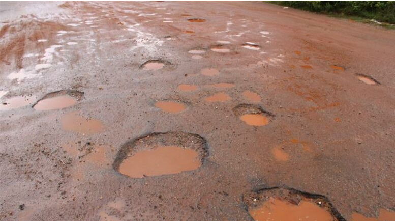 Holes upon holes on the road. 
