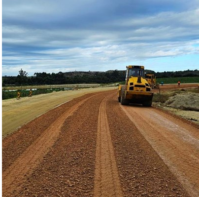 The compaction process after processing the basecourse layer.