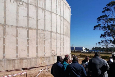 What designers and architects envisaged the facility looking like, left, and what is on the ground now.