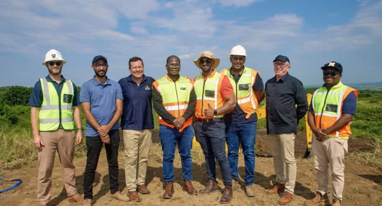  Third from the left: Trenlely Tilbrook of Collins Residential, Justice Chauke, representative of SANRAL, second on the right, Mark Weedon, and the R&B Civils team. 