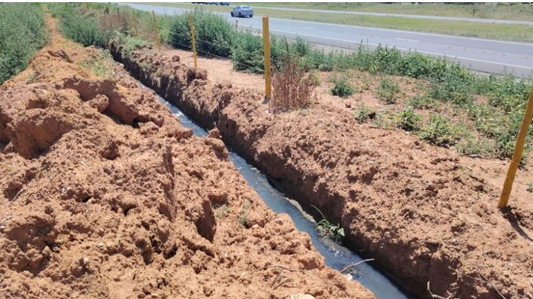  Residents dig makeshift trenches to divert overflowing sewage as authorities struggle to deliver a permanent fix.