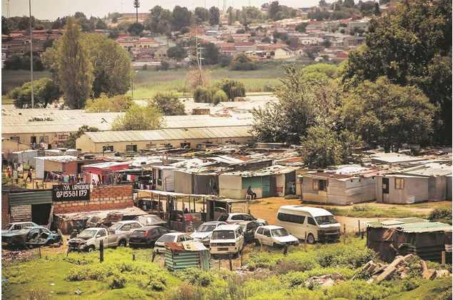 Nancefield Hostel was built in the early 1950s. An informal settlement has mushroomed around it.